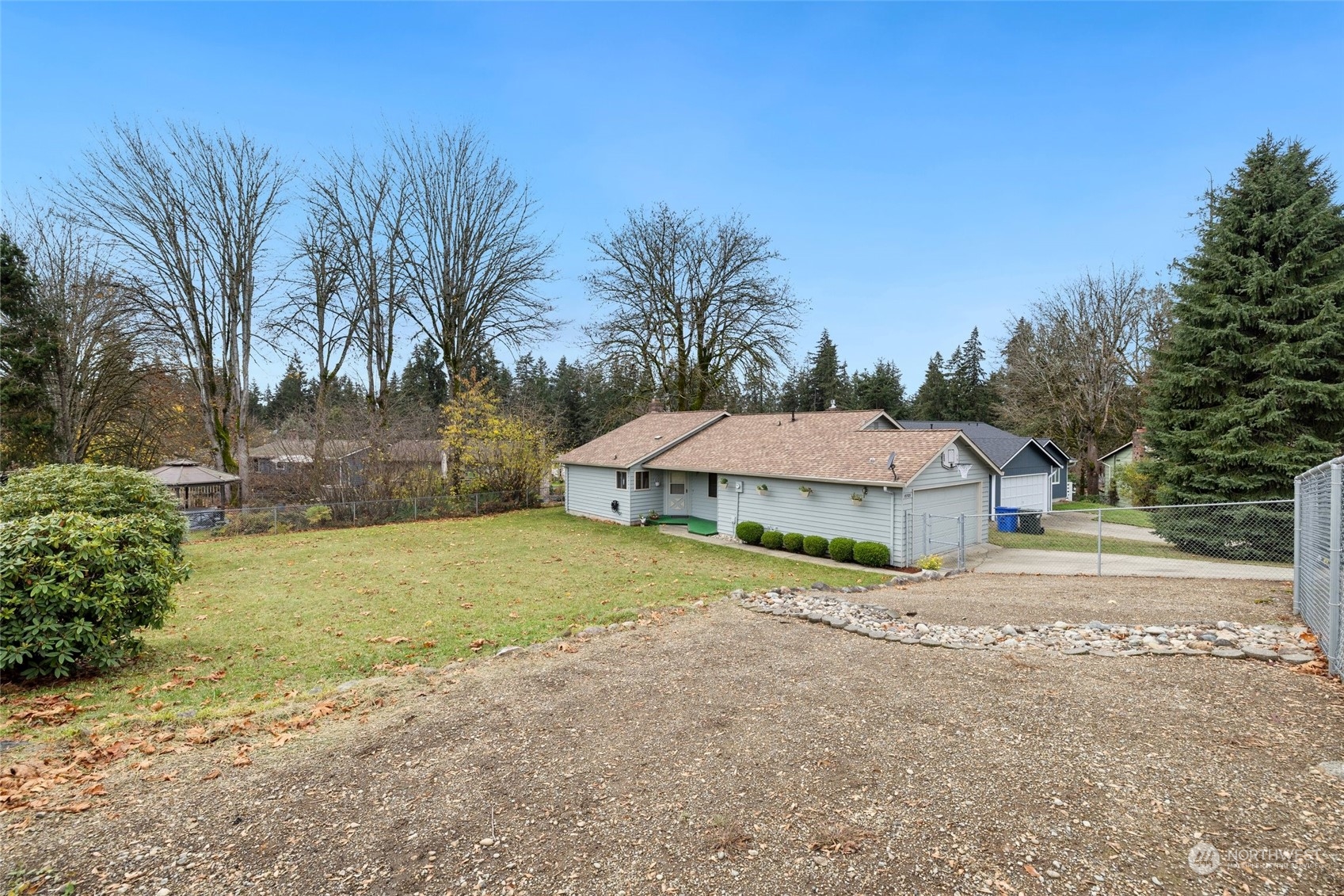 a house with trees in the background