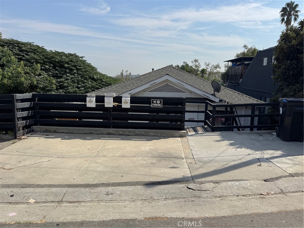 a front view of a house with a garage