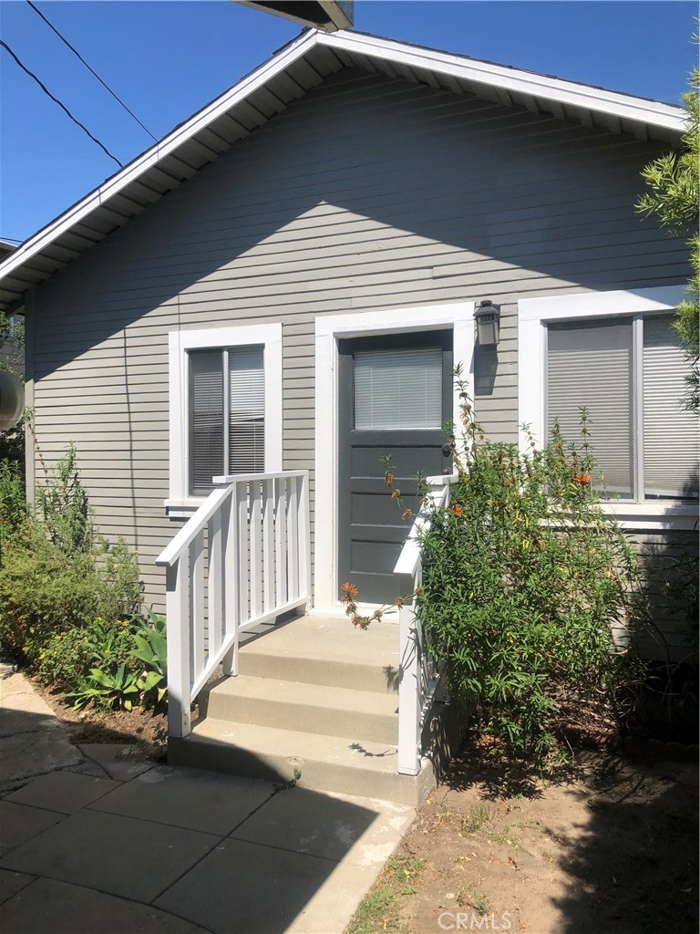 a front view of a house with a garage