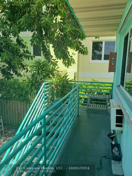 a balcony with outdoor space