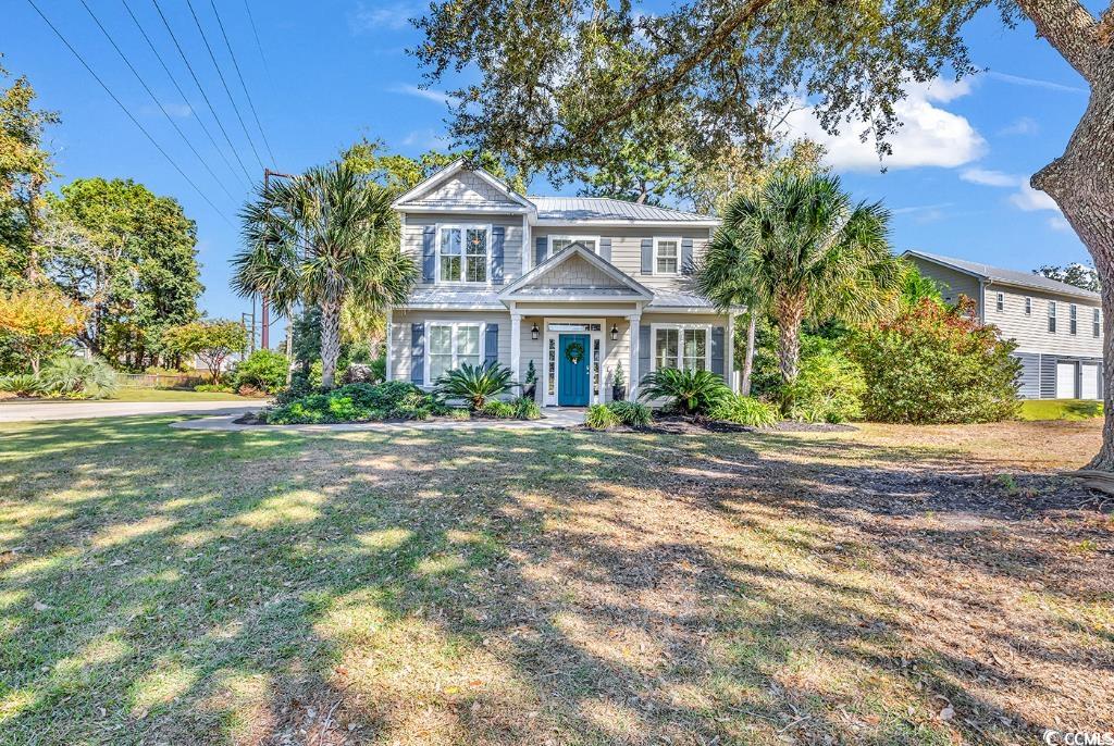 View of front facade with a front lawn