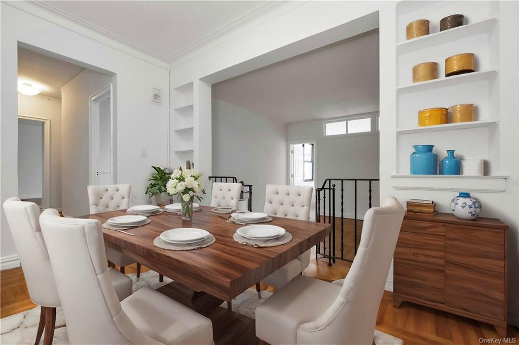 a view of a dining room and livingroom with furniture