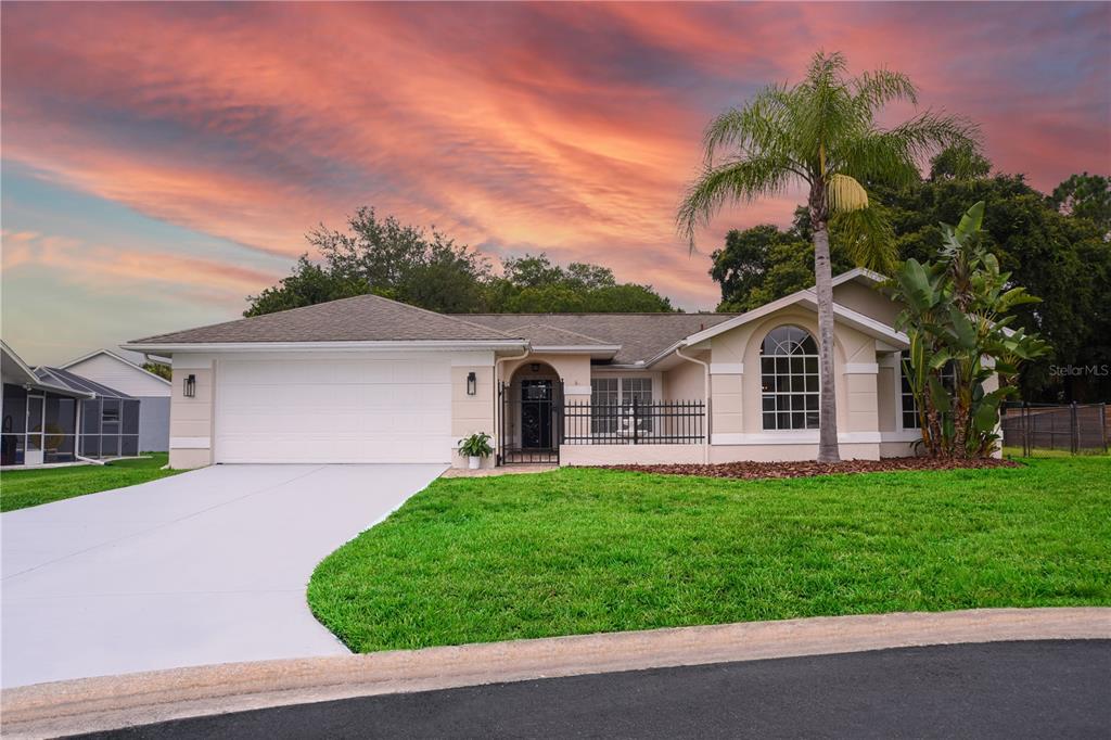 front view of a house with a yard