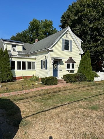 a view of a yard in front of house