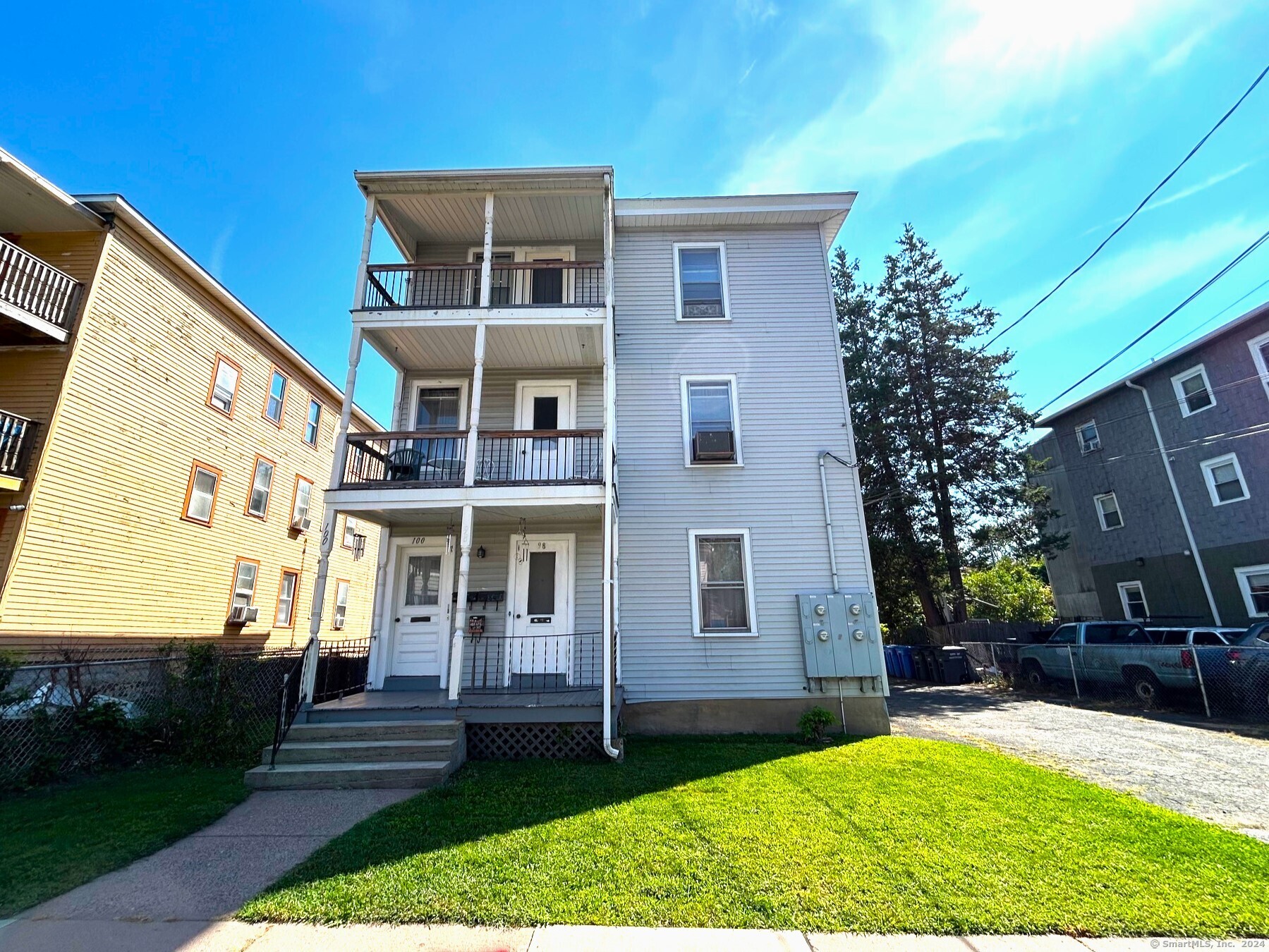 a view of house with yard