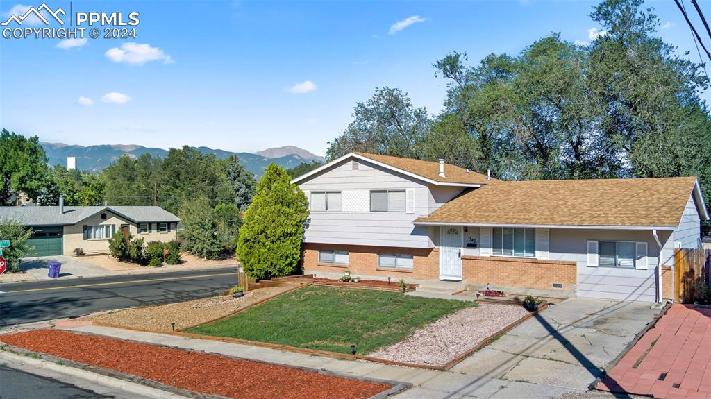 Tri-level home with a mountain view