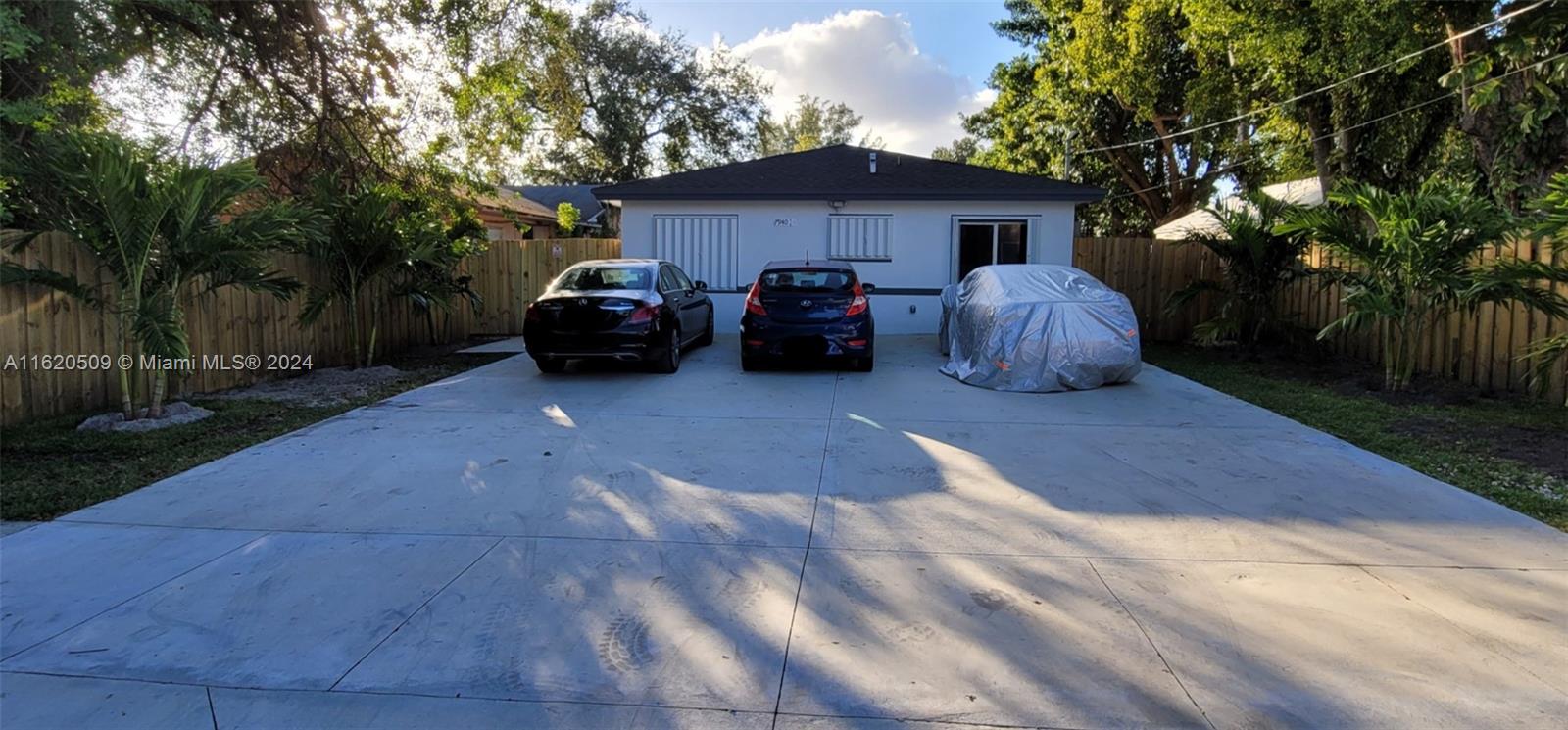 a view of a car in front of house