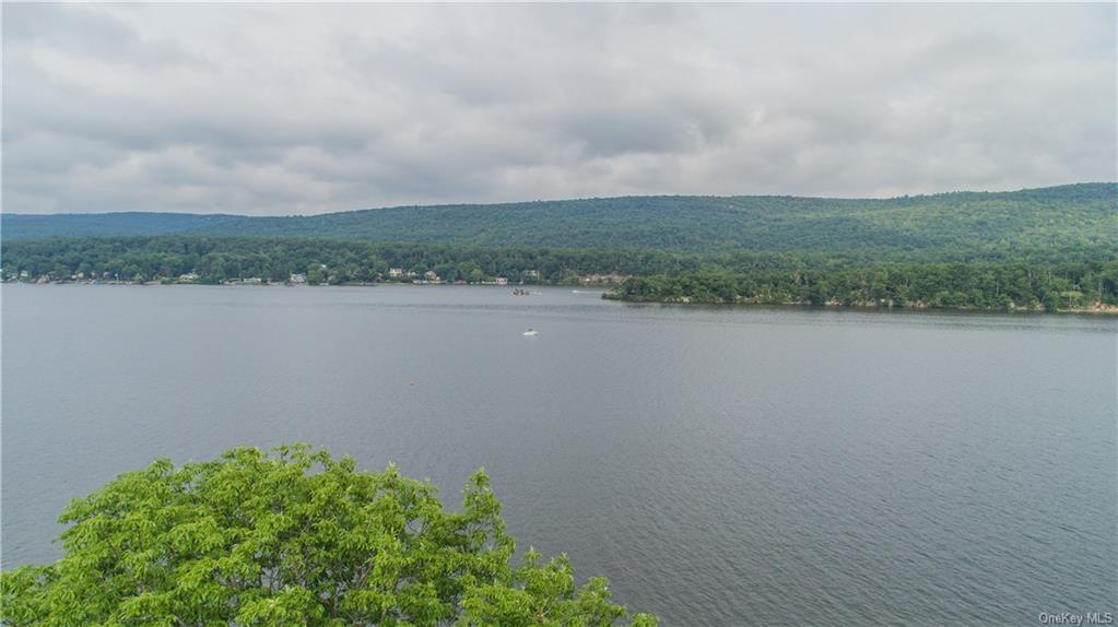 a view of a lake with a big yard