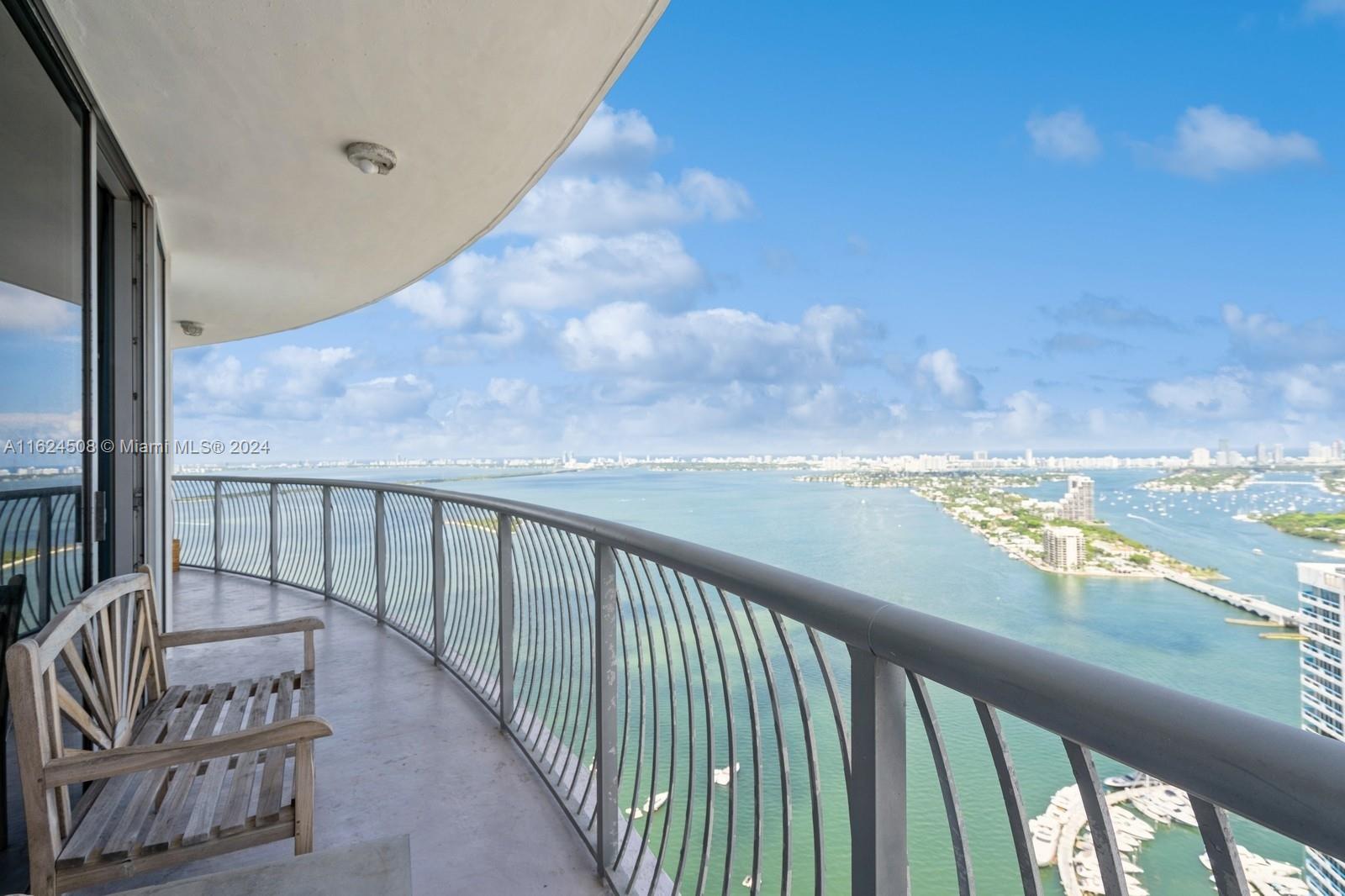 a view of balcony with furniture