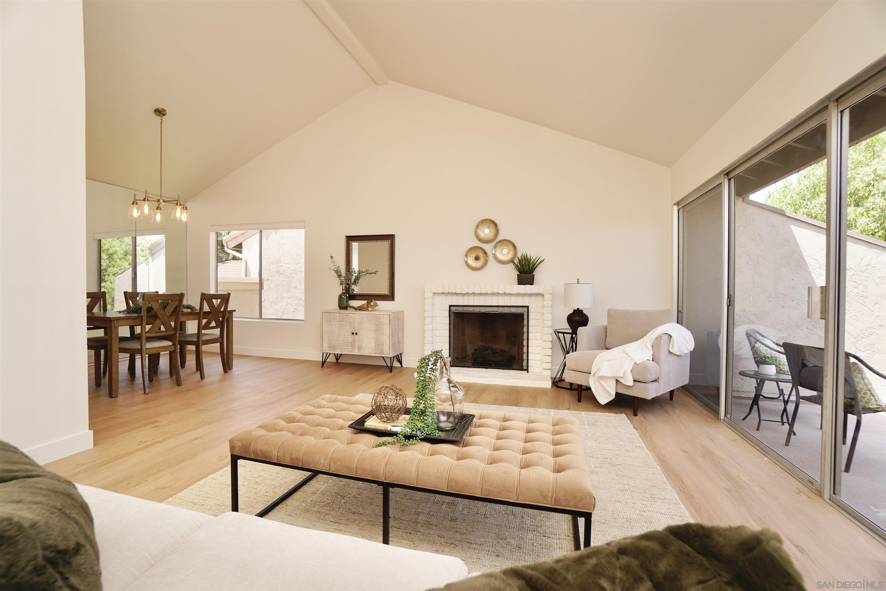 a living room with furniture or couch and a fireplace