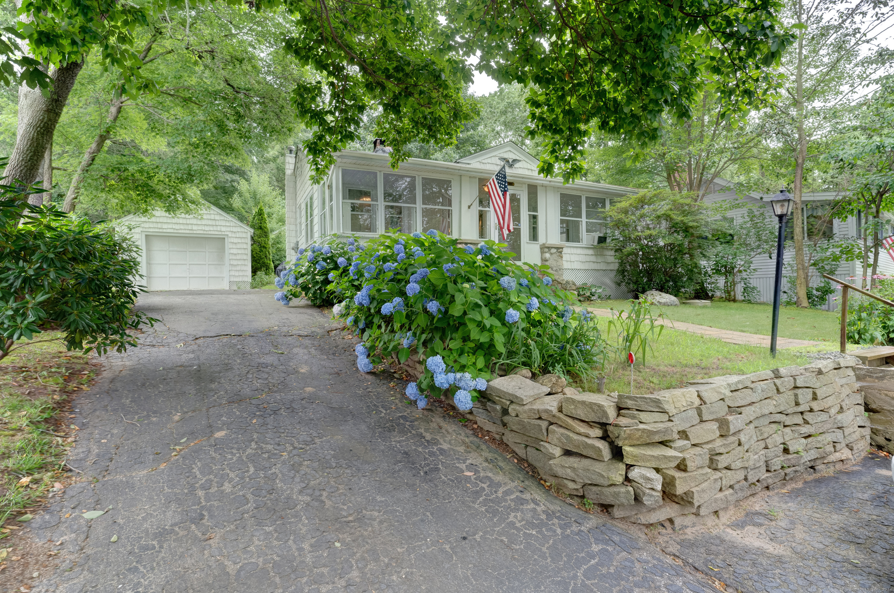 a house view with a garden space