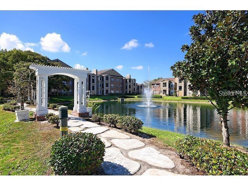 a swimming pool view with a outdoor space