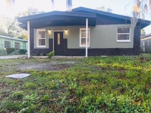 a view of backyard of house