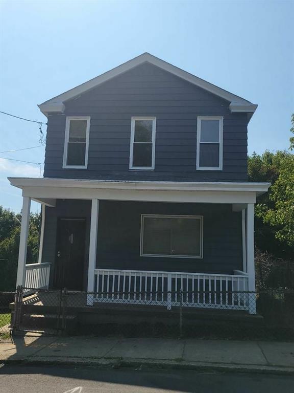 a view of a house with a deck