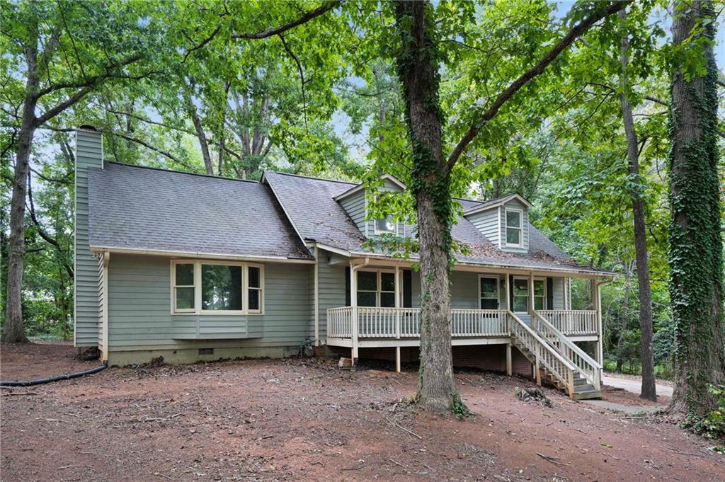 a view of house with a outdoor space