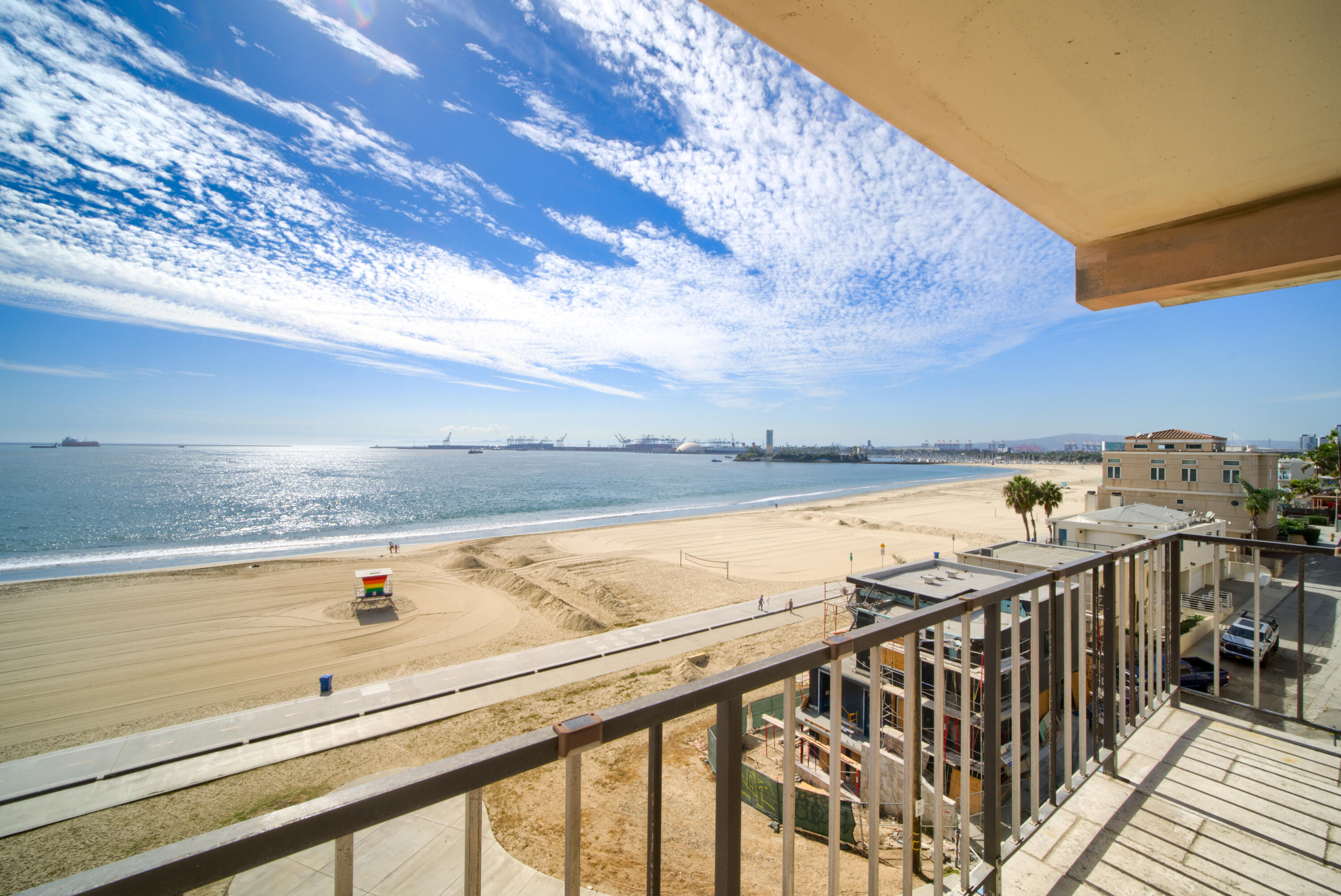 a view of a ocean with an outdoor seating