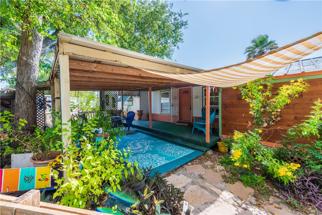 ATTRACTIVE ENTRY AND PATIO AREA FOR ENTERING FRONT