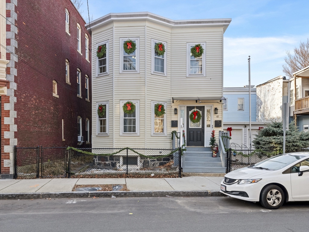 a car parked in front of a building