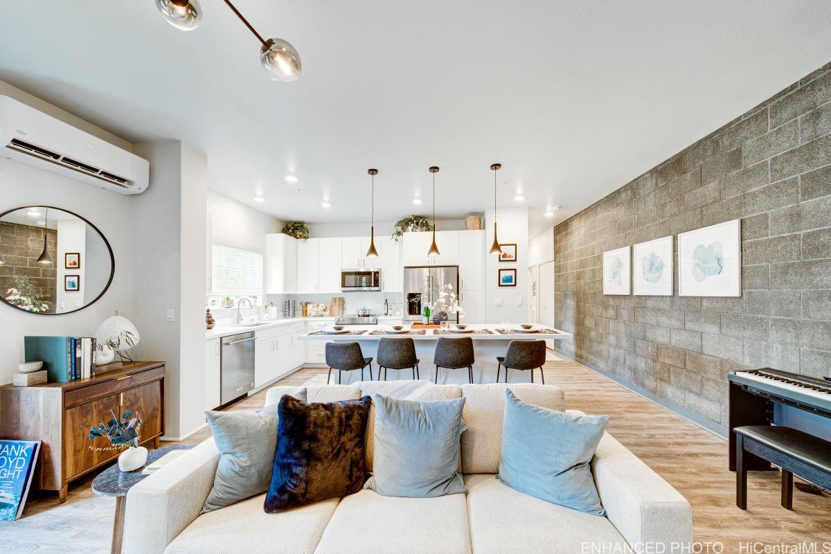 a living room with fireplace furniture and a view of living room