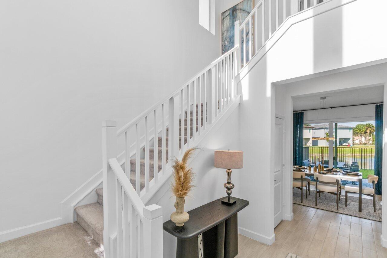 a view of entryway livingroom and hall with wooden floor