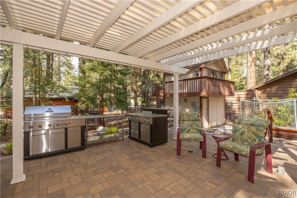 Outdoor Kitchen with Covered Gazebo and lots of ro