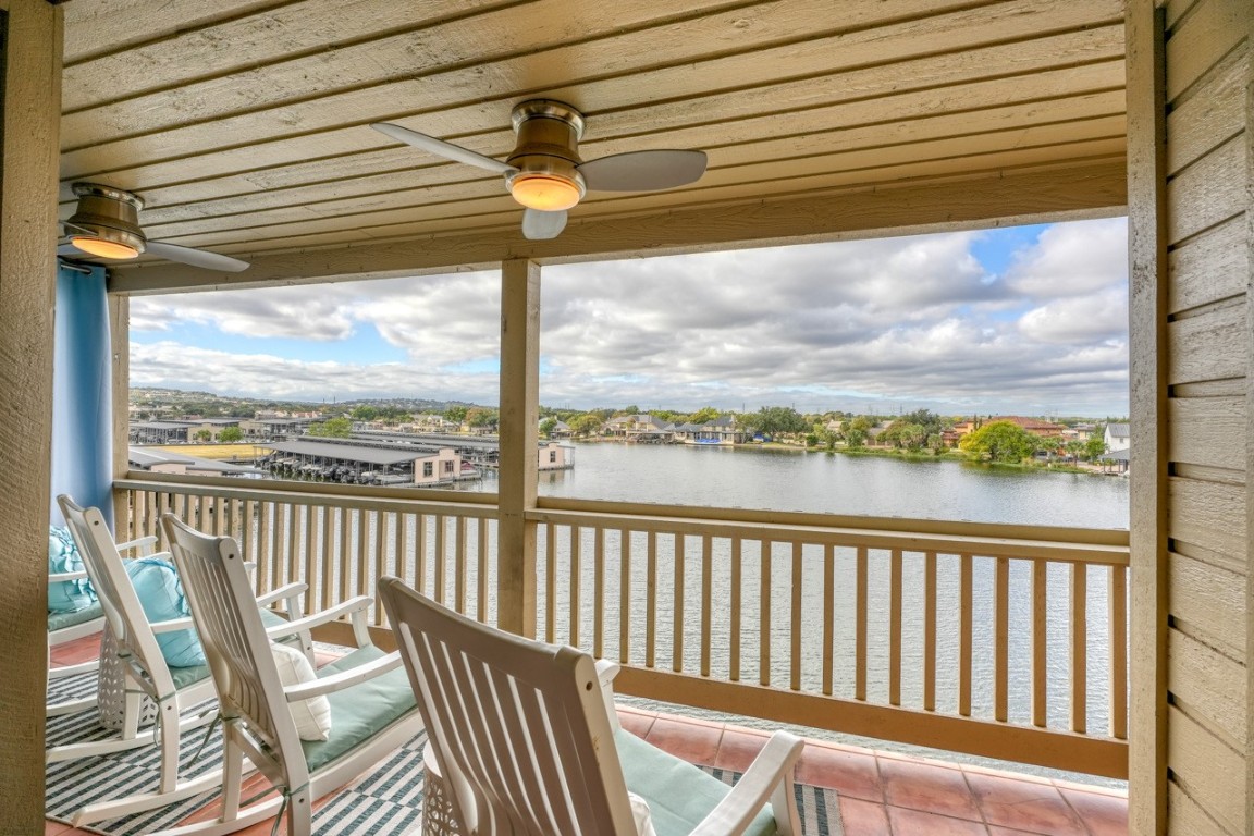 a view of a two chair in the balcony