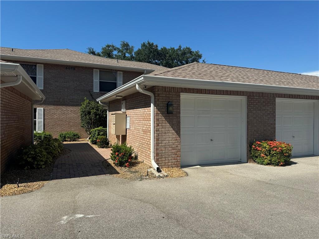 View of front of home featuring a garage