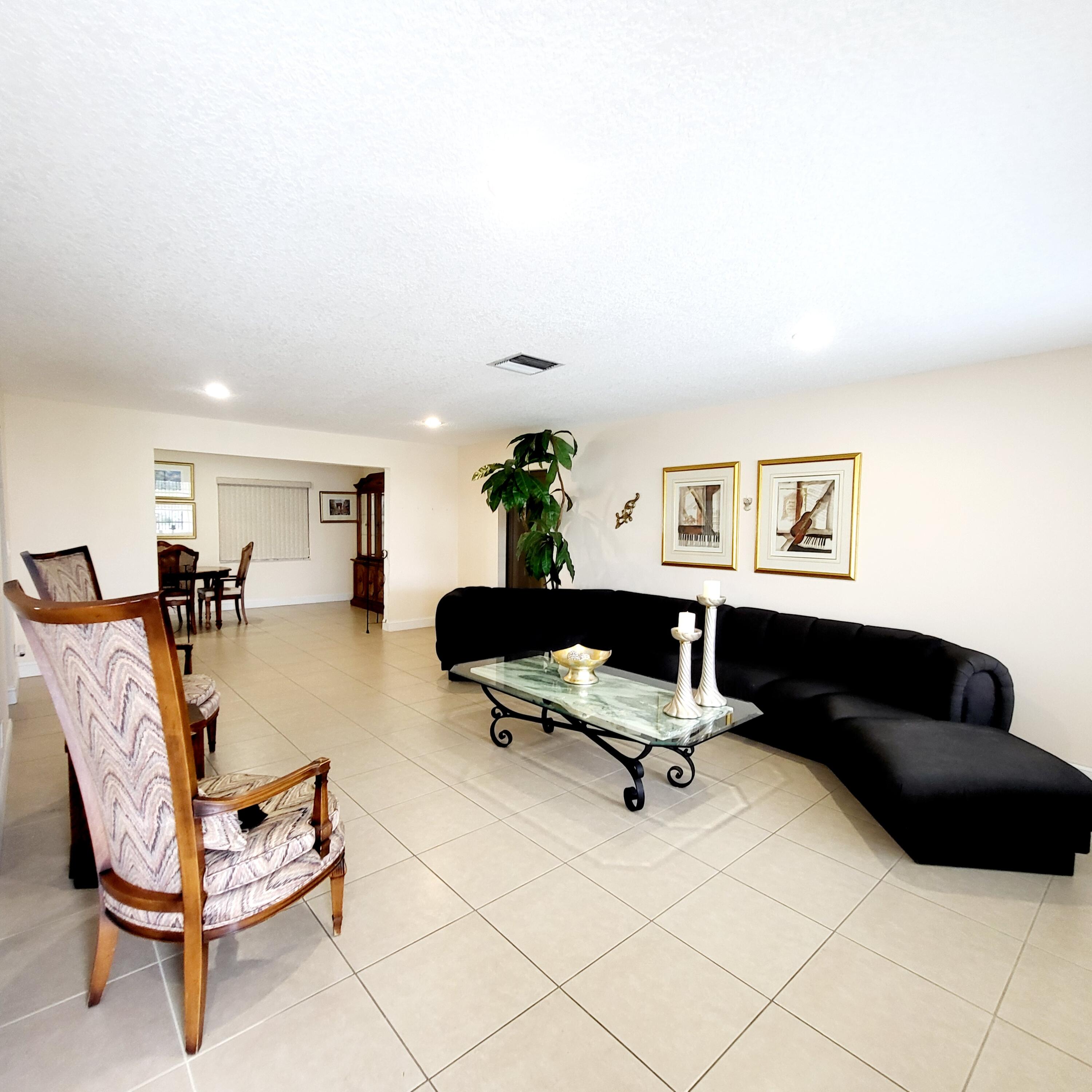 a living room with furniture and a couch