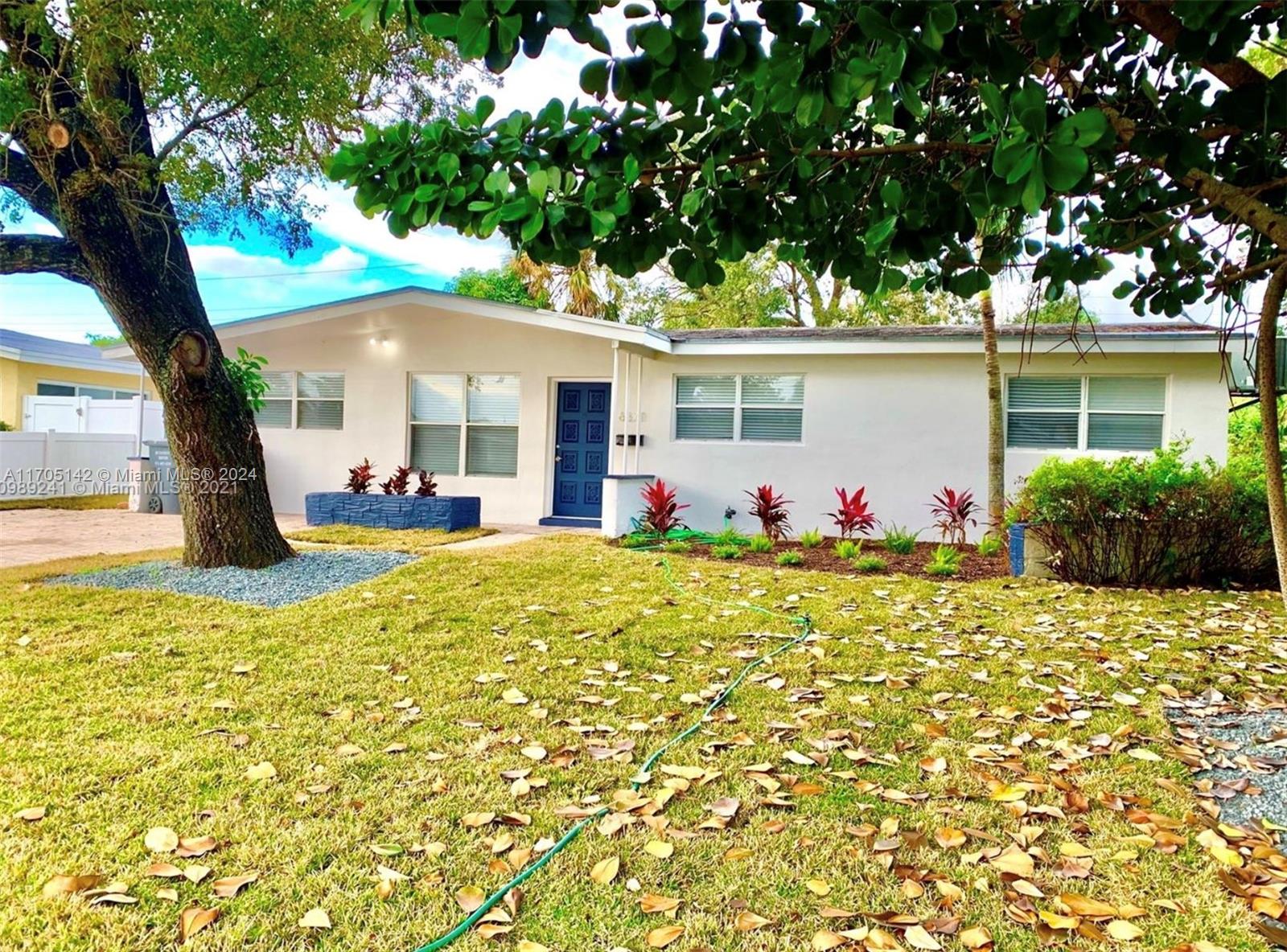 a front view of a house with patio