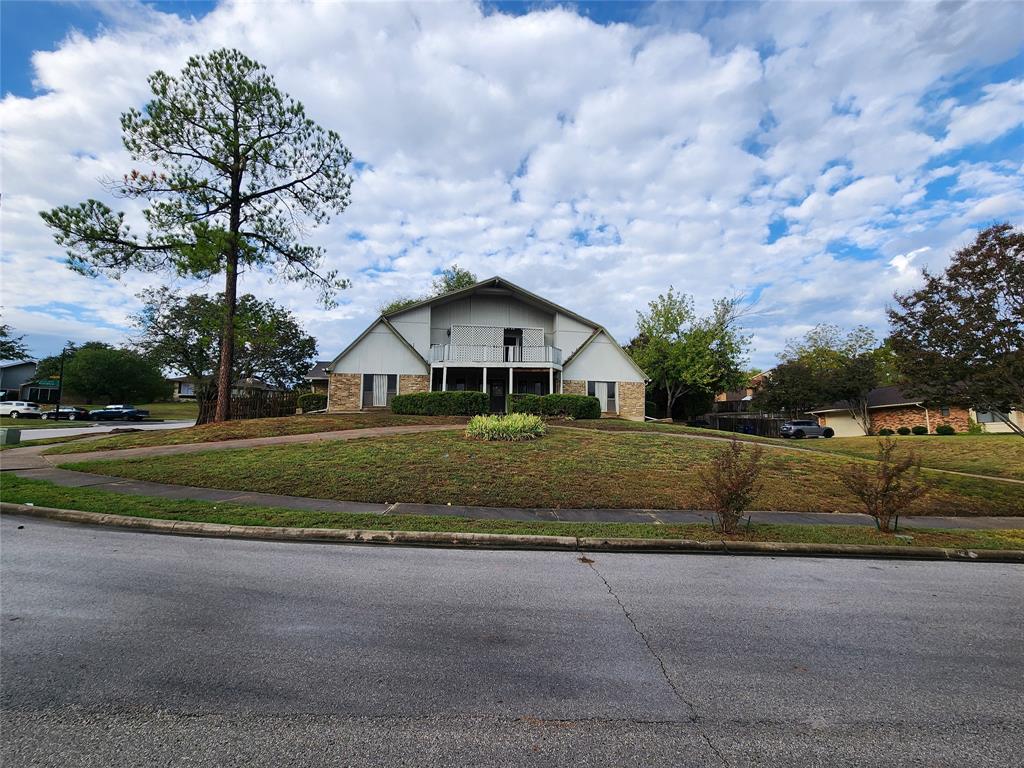 a view of house with outdoor space