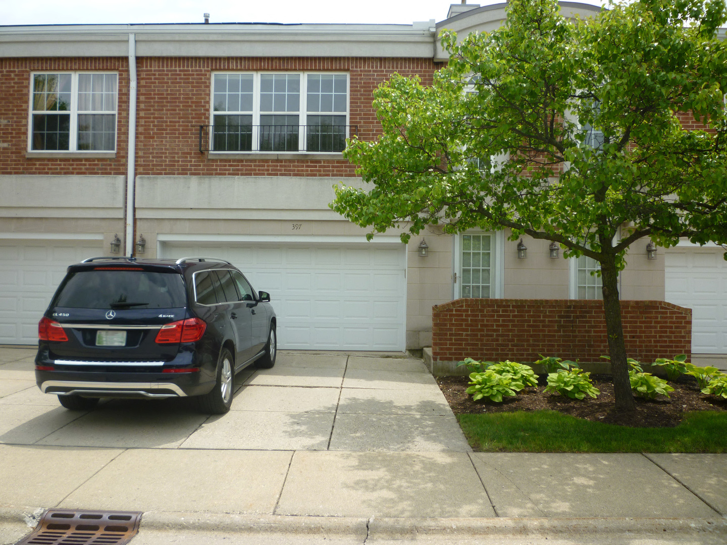 a car parked in front of a house