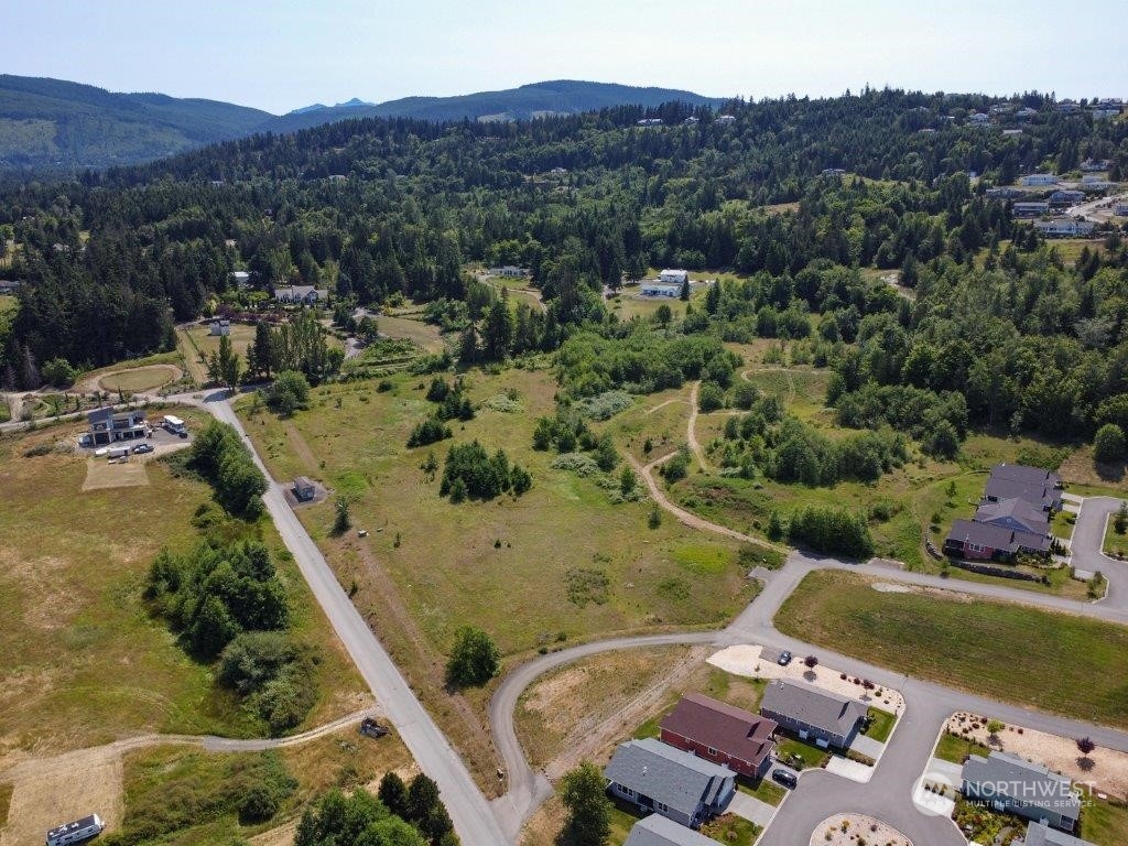 an aerial view of a house with a garden