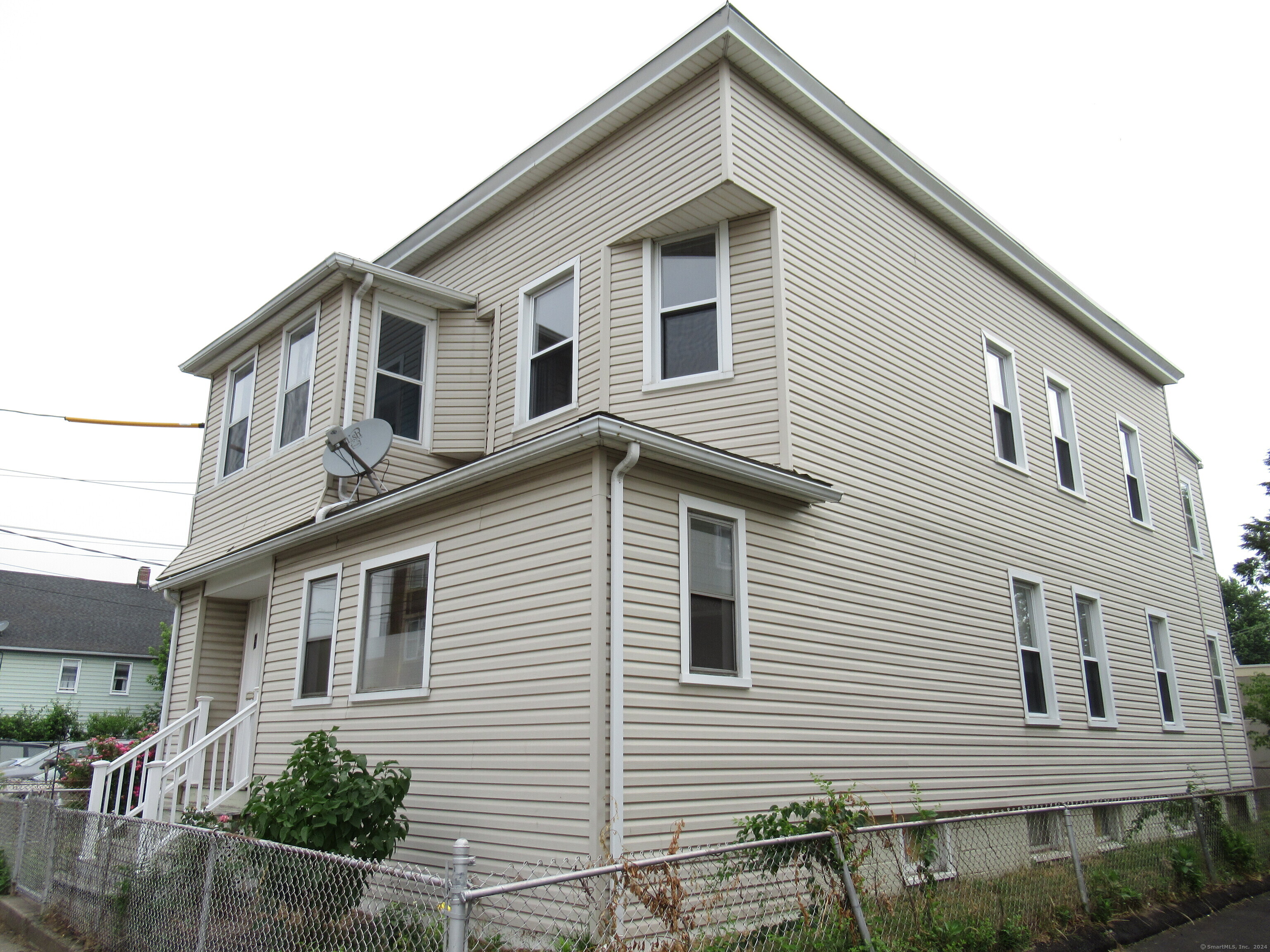 a front view of a house with garage