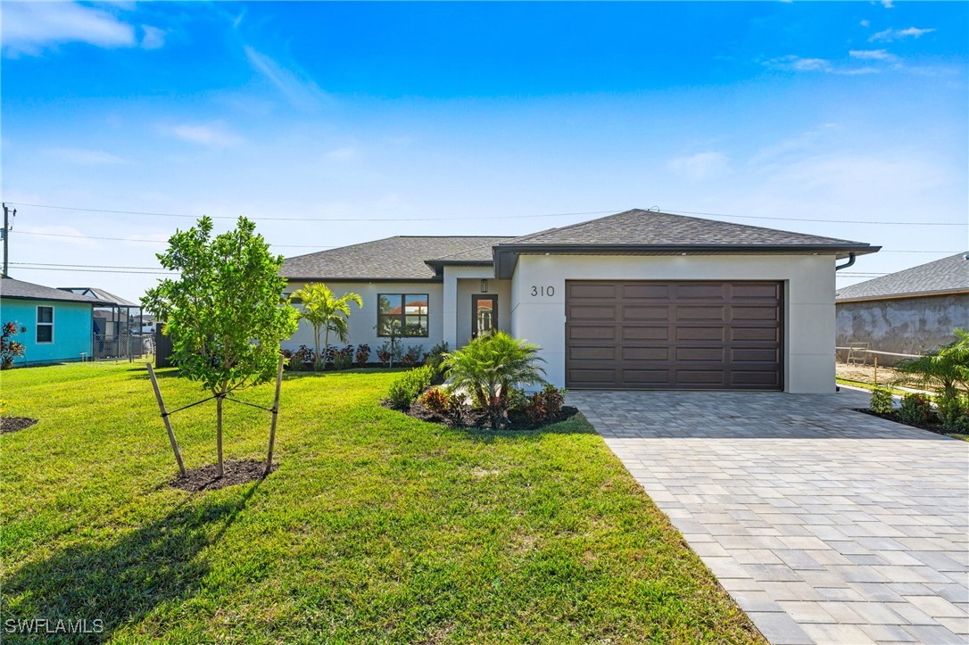 a house view with a garden space