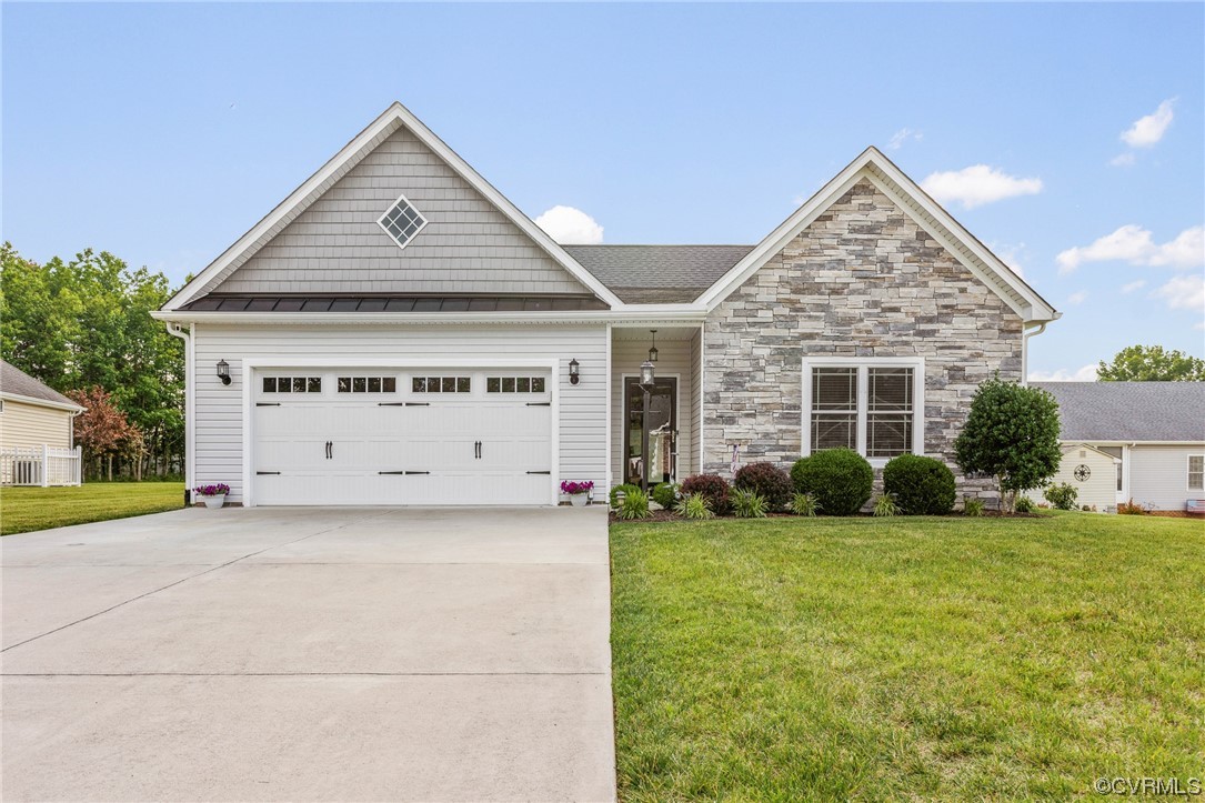 front view of a house with a yard