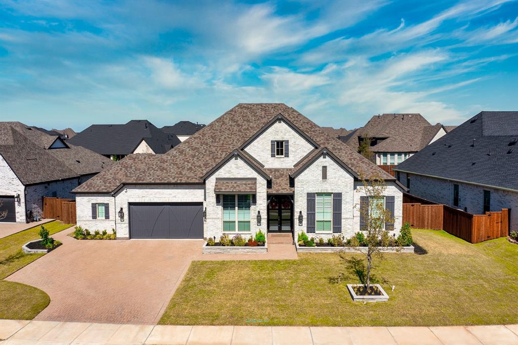 a front view of house with yard porch and seating space