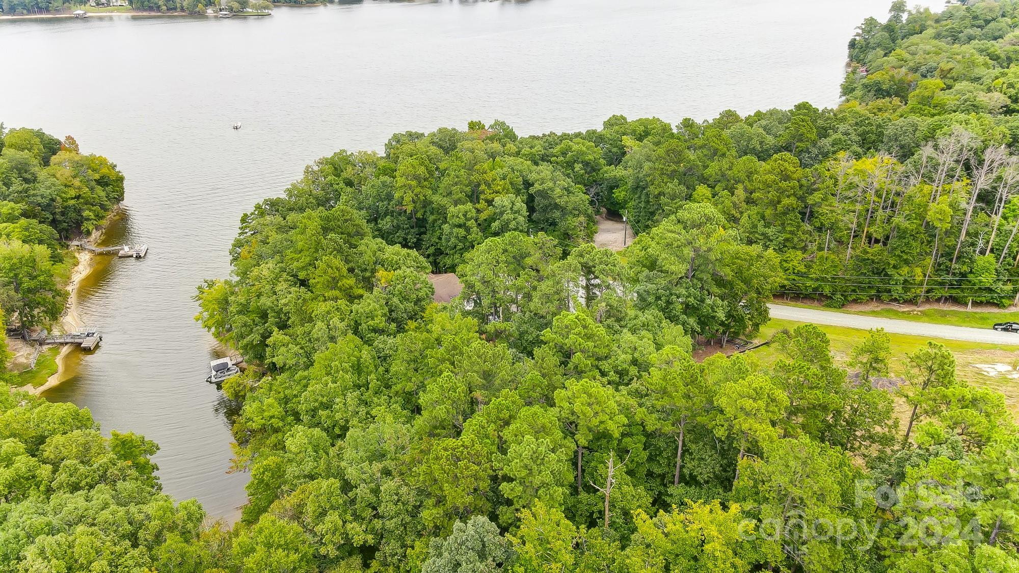 a view of a lake with a yard