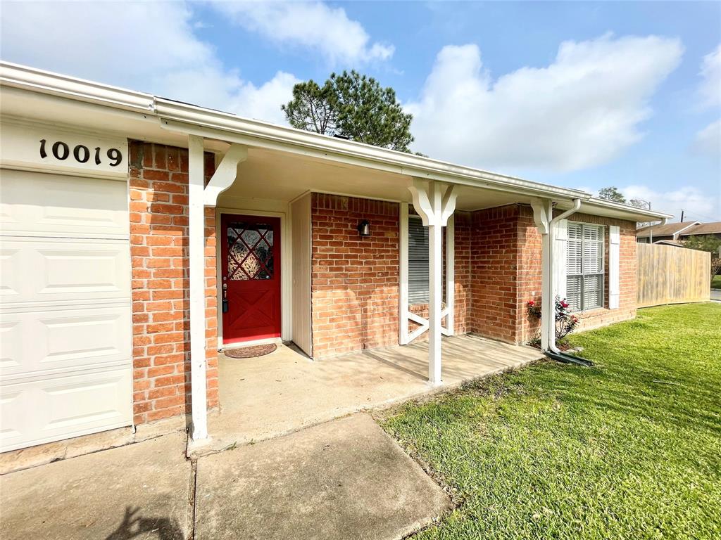 a front view of a house with a porch