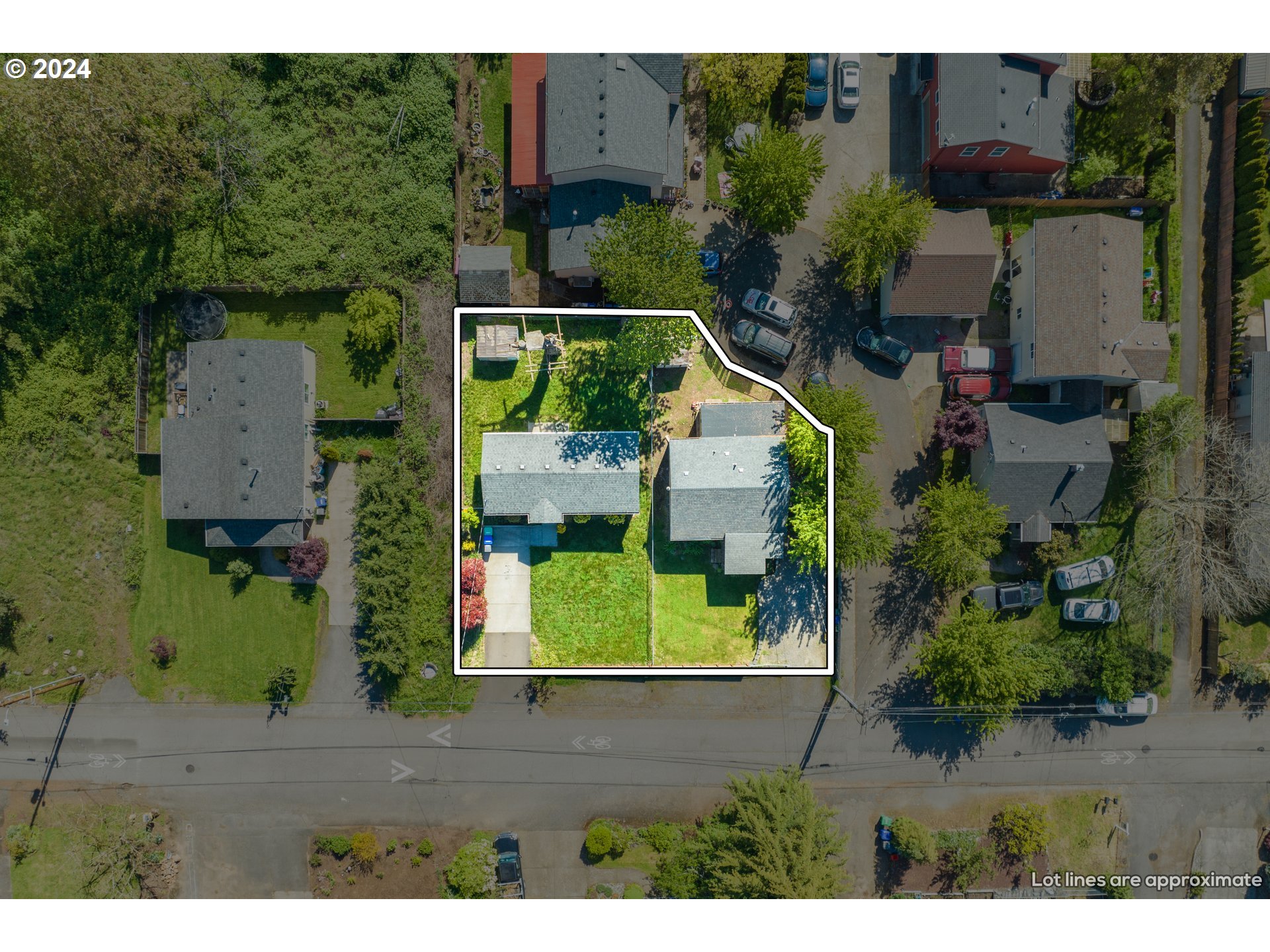 an aerial view of house with yard swimming pool and outdoor seating