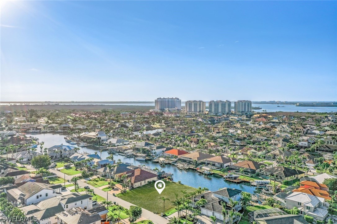 an aerial view of a city with lots of residential buildings