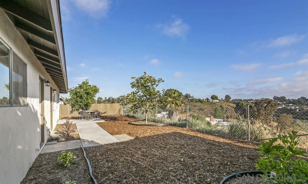 a view of an outdoor space and a yard