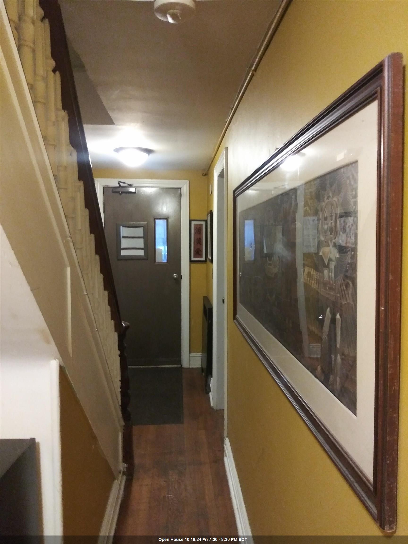 a view of hallway with stairs