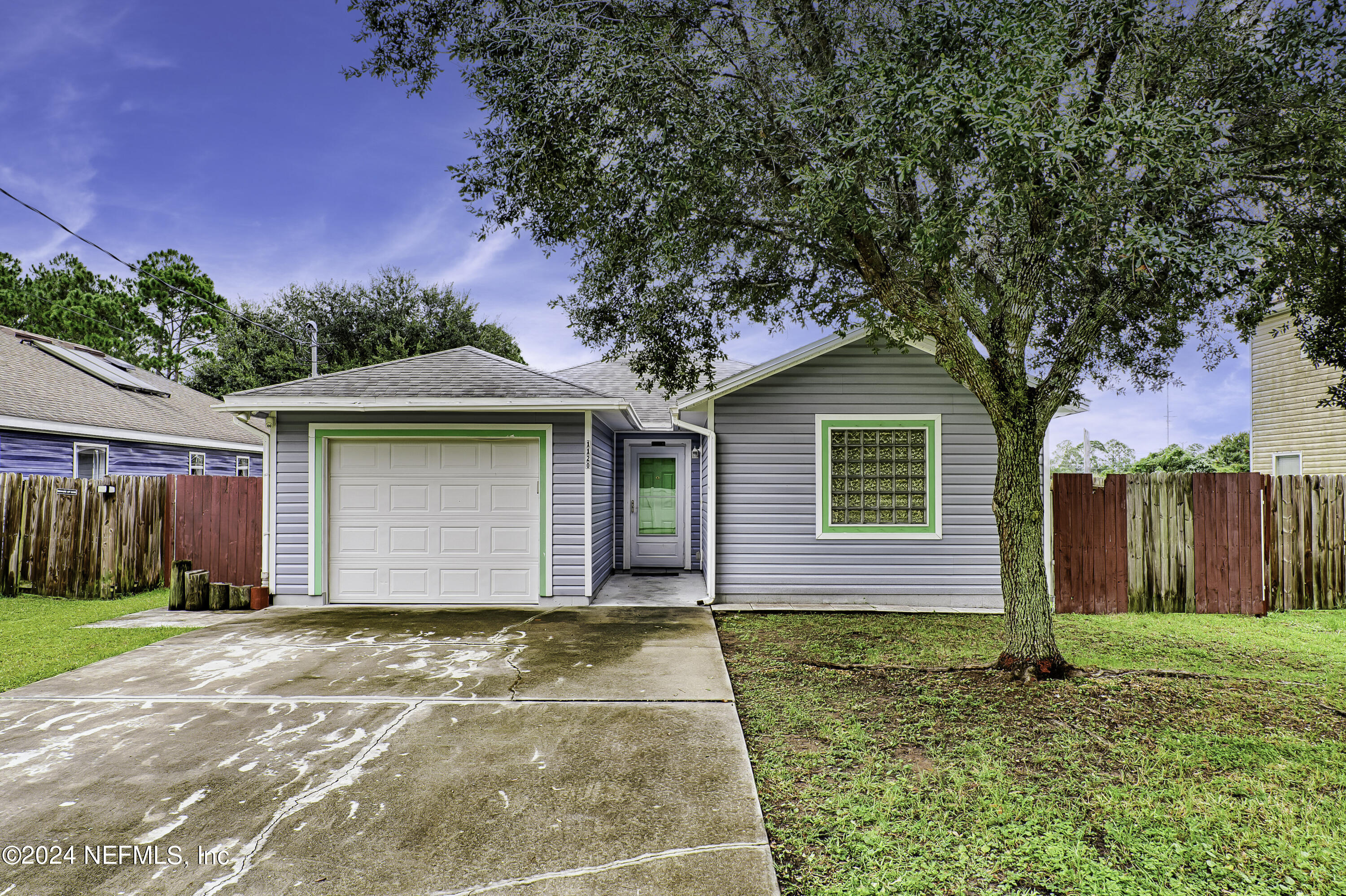 a front view of house with yard