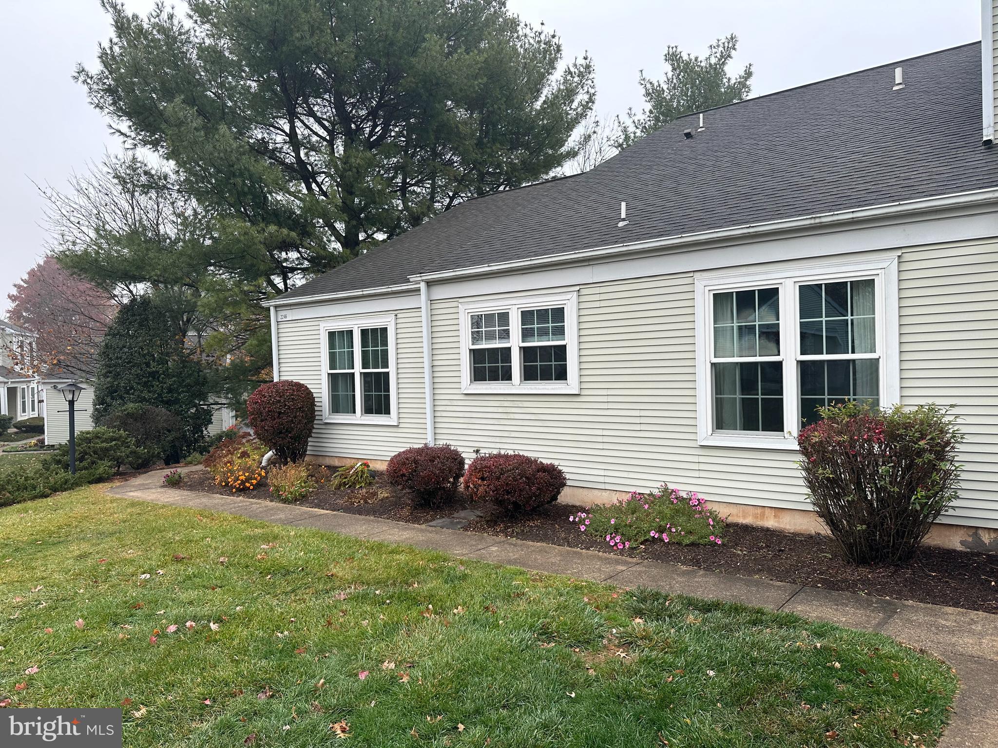 a house view with a garden space