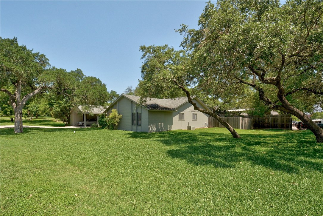 The spacious yard offers ample room for everyone to enjoy.