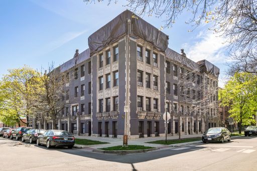 a front view of a building with street view