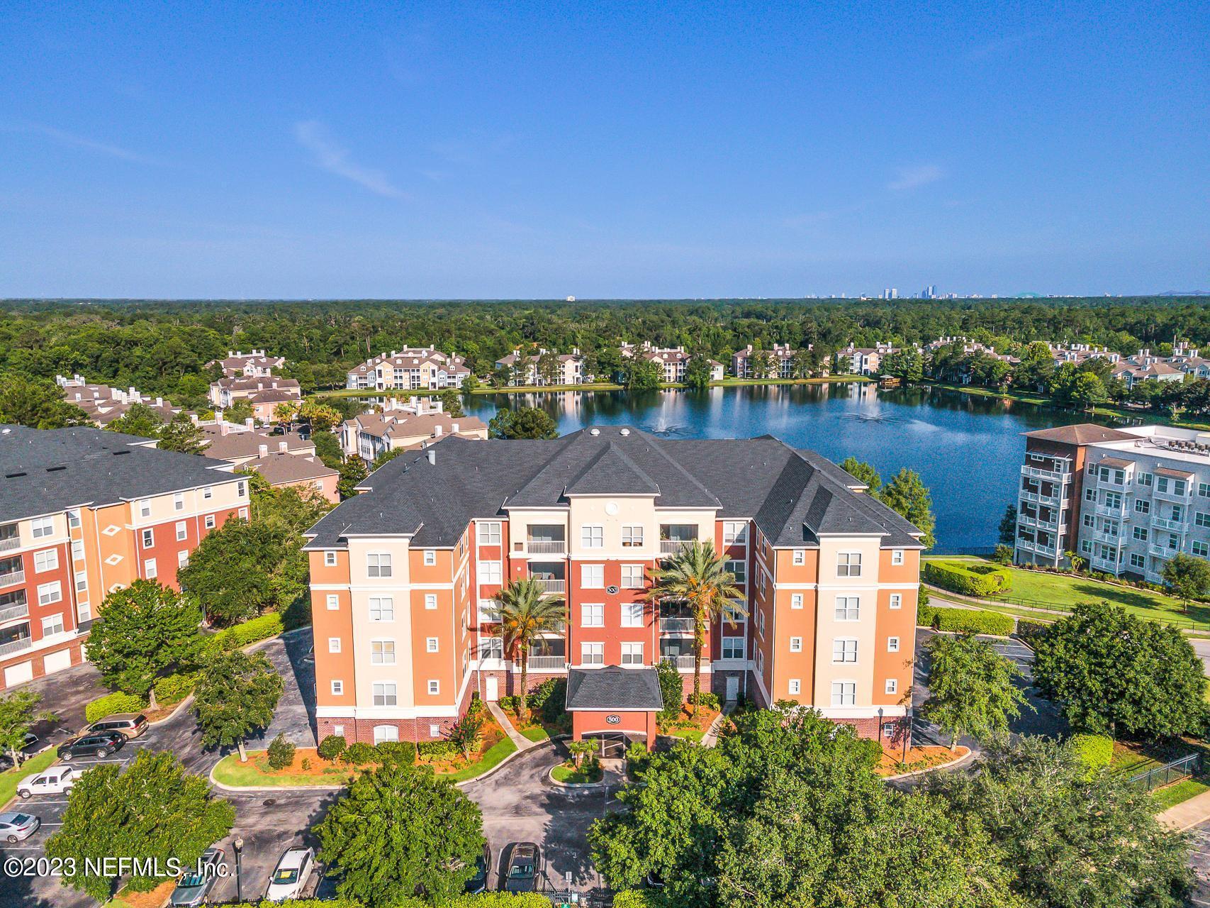 a view of a lake with a houses