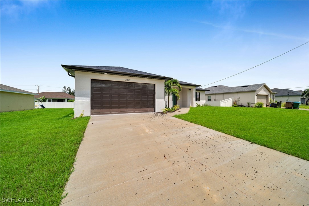 a front view of house with yard