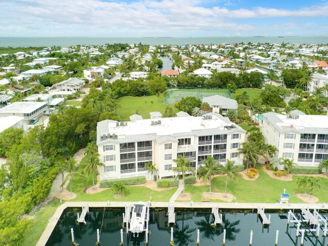 $1,225,000 | 101 Gulfview Drive, Unit 116D & 30' BOAT SLIP | Islamorada, Village of Islands