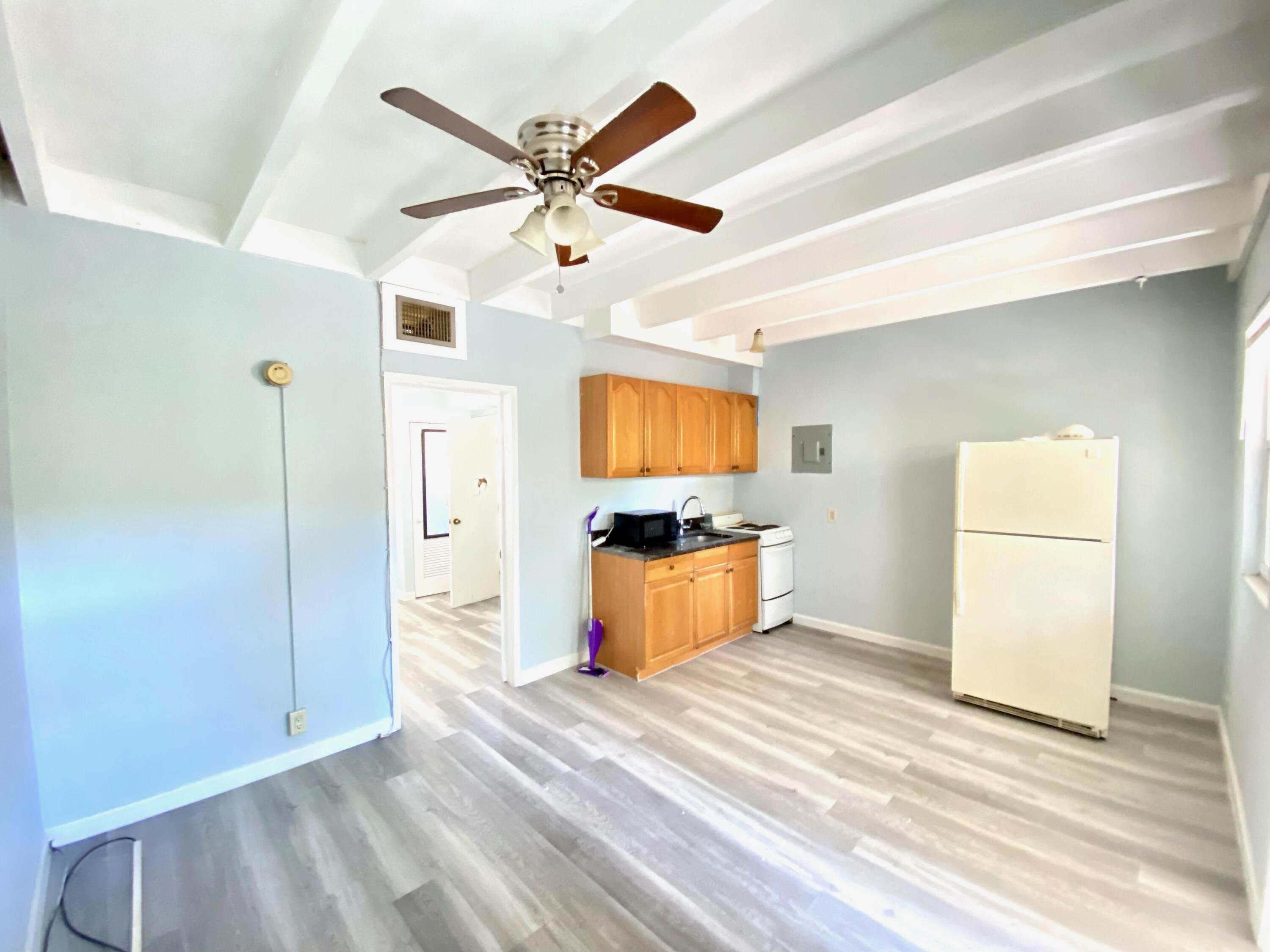 a view of a livingroom with a flat screen tv